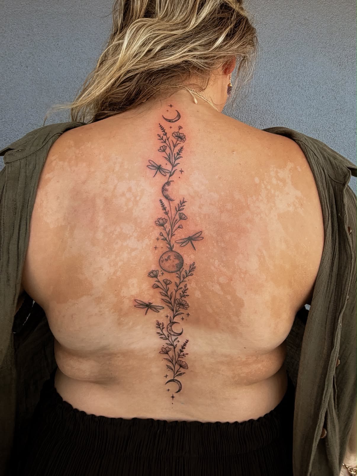 Fine-line tattoo by Gabby