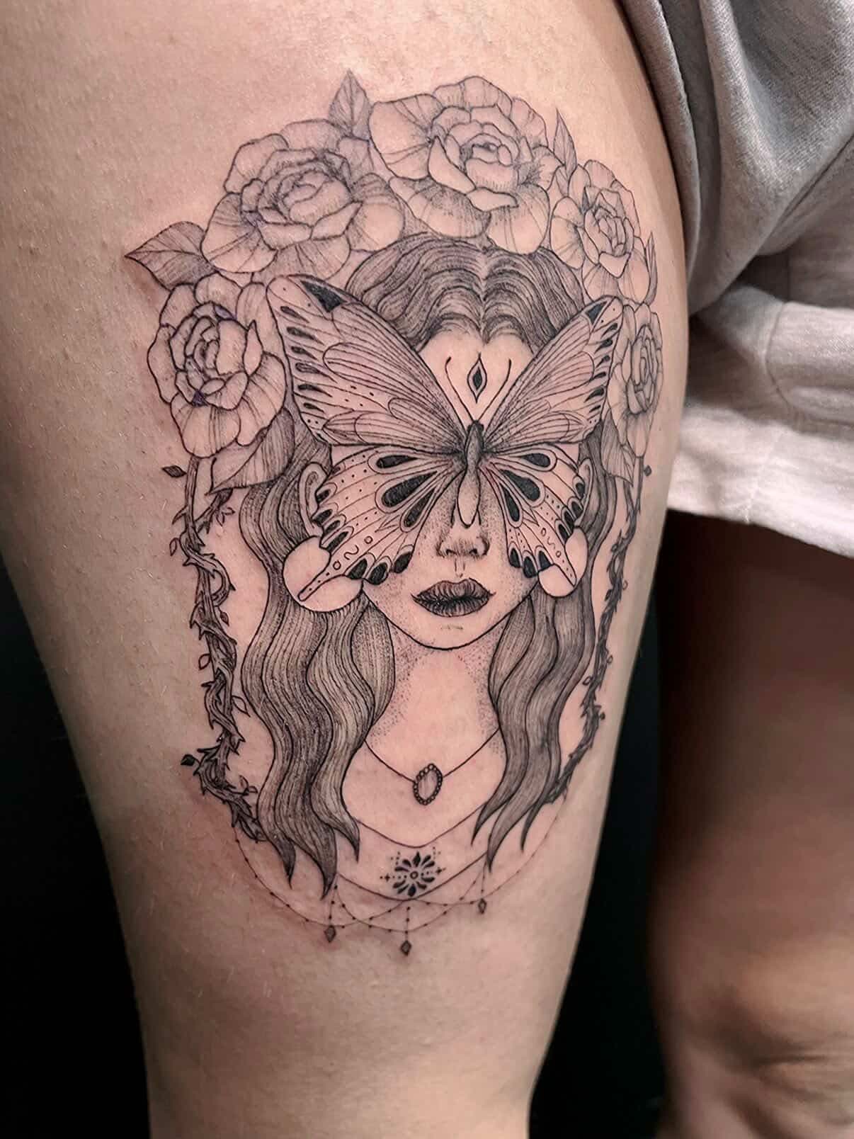 Dotwork realism portrait of a woman with a shaded butterfly over her eyes, surrounded by roses, on the thigh.