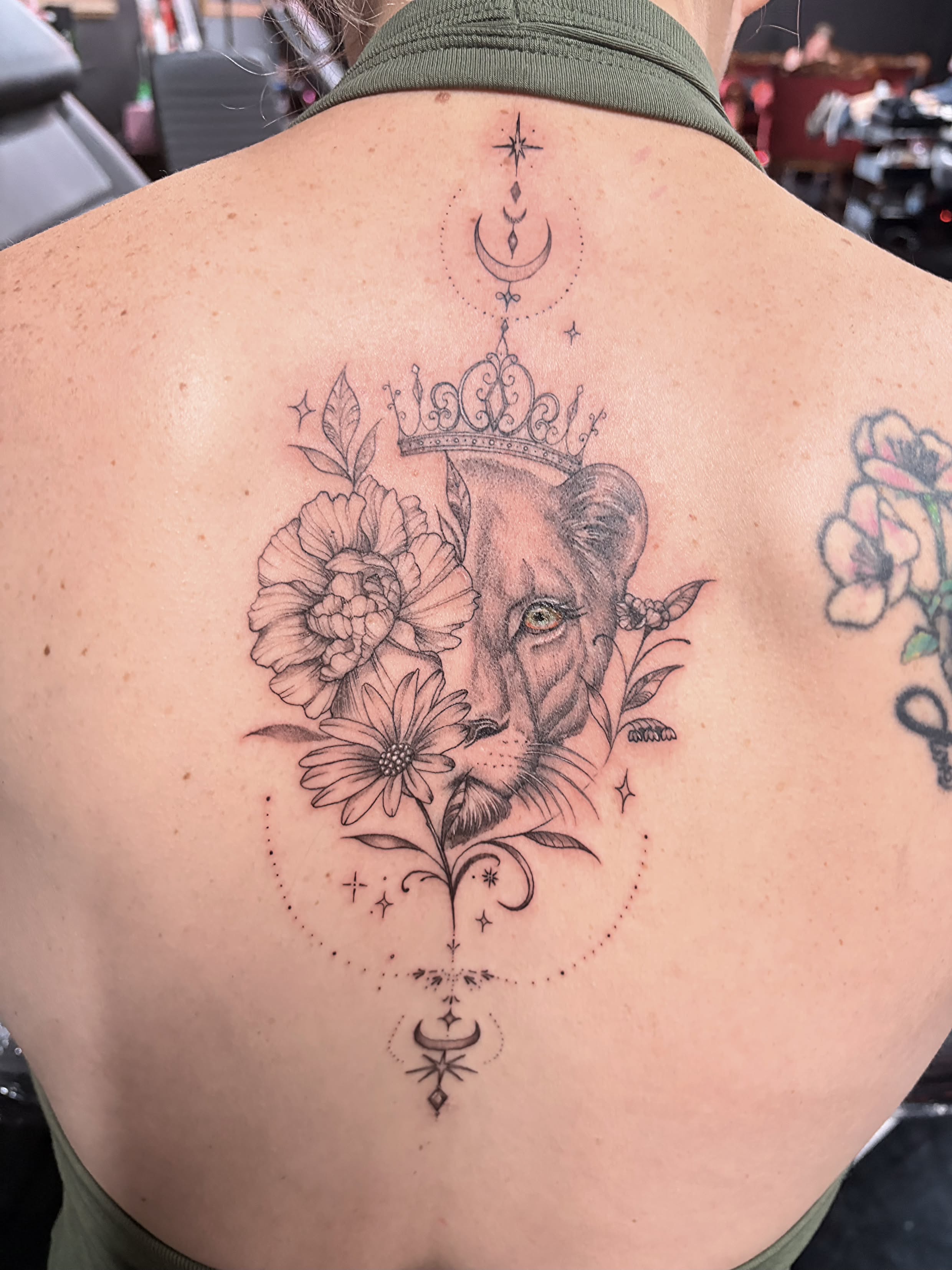 Detailed realism tattoo by Lilly