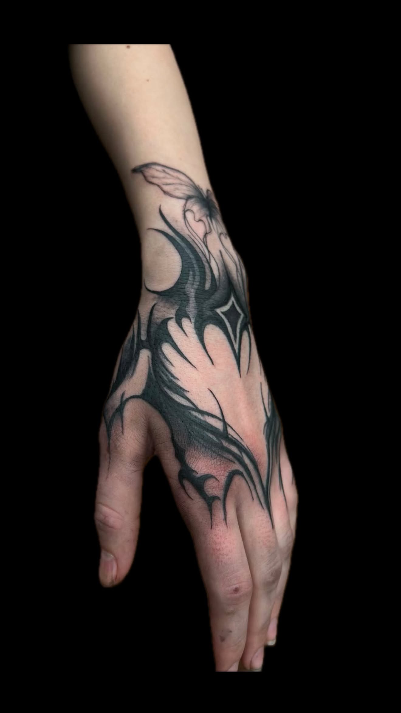 Blackwork tattoo by Lindsay