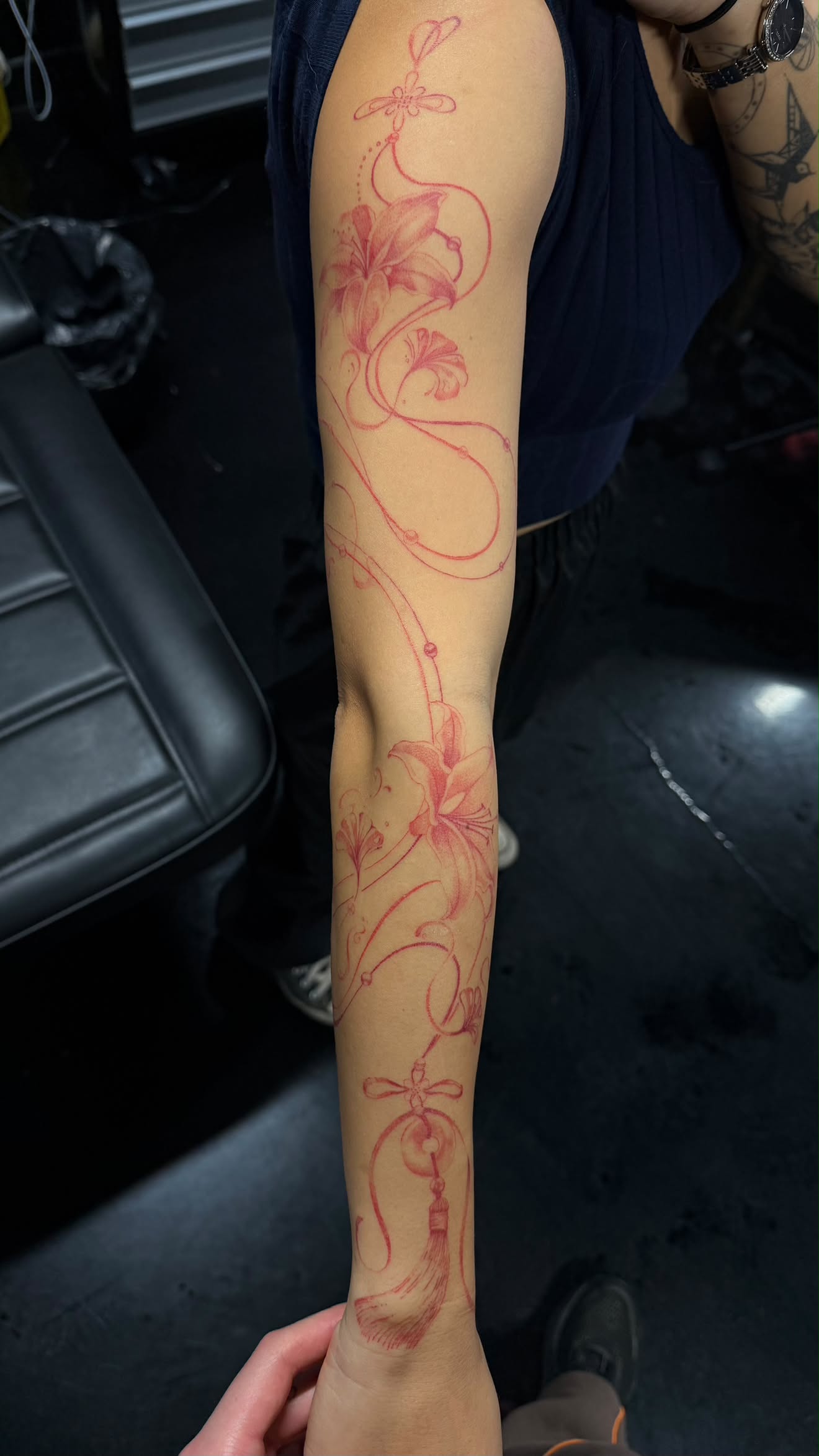 Bold blackwork tattoo by Ninji