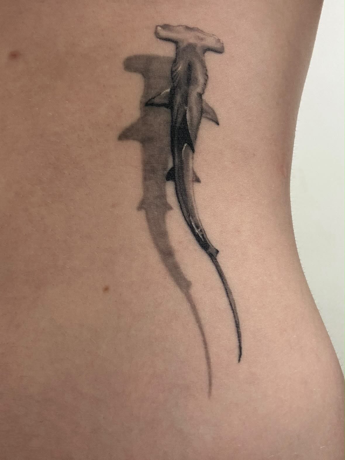 Fine-line tattoo by Ninji