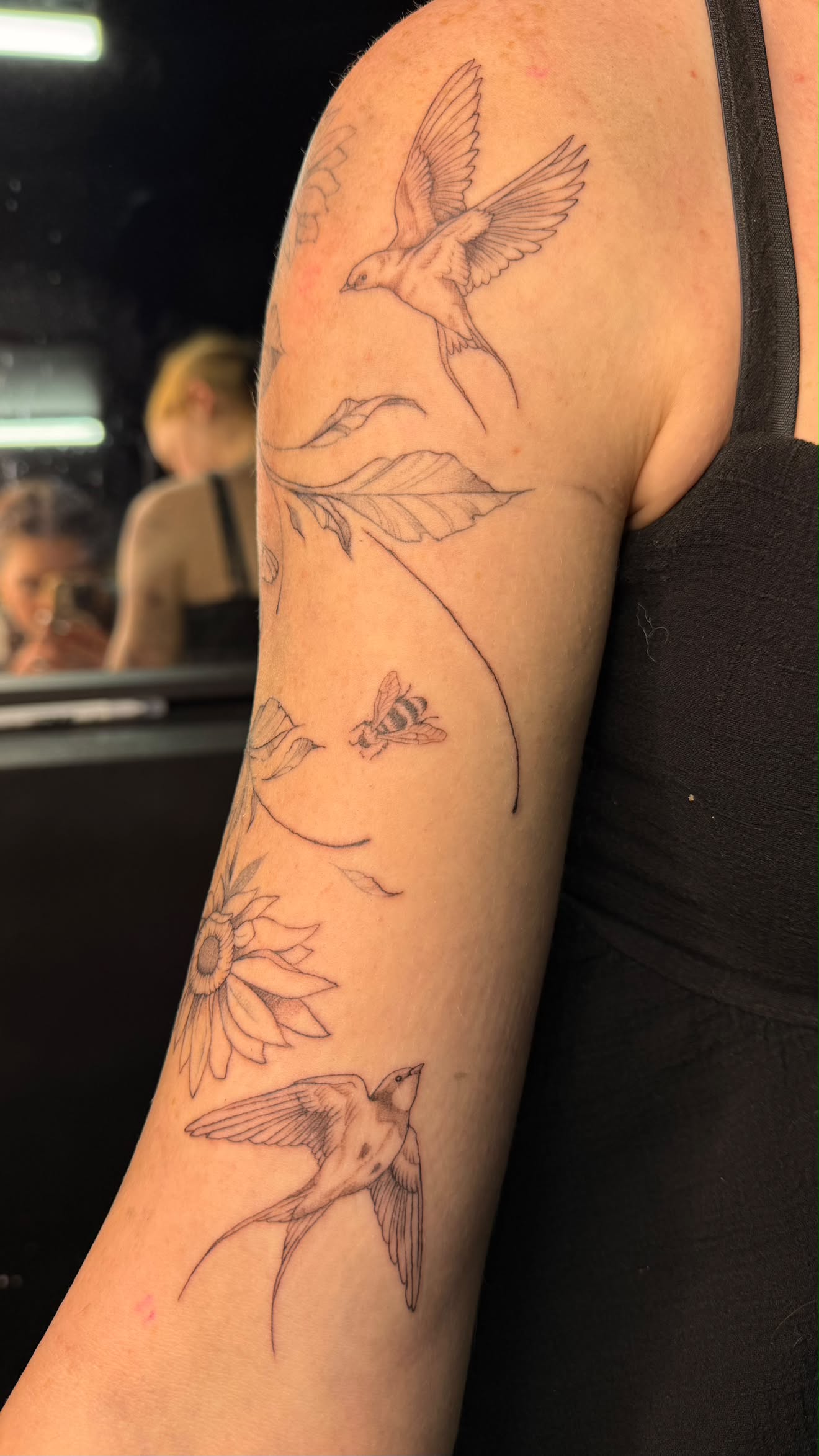 Fine-line tattoo by Ninji
