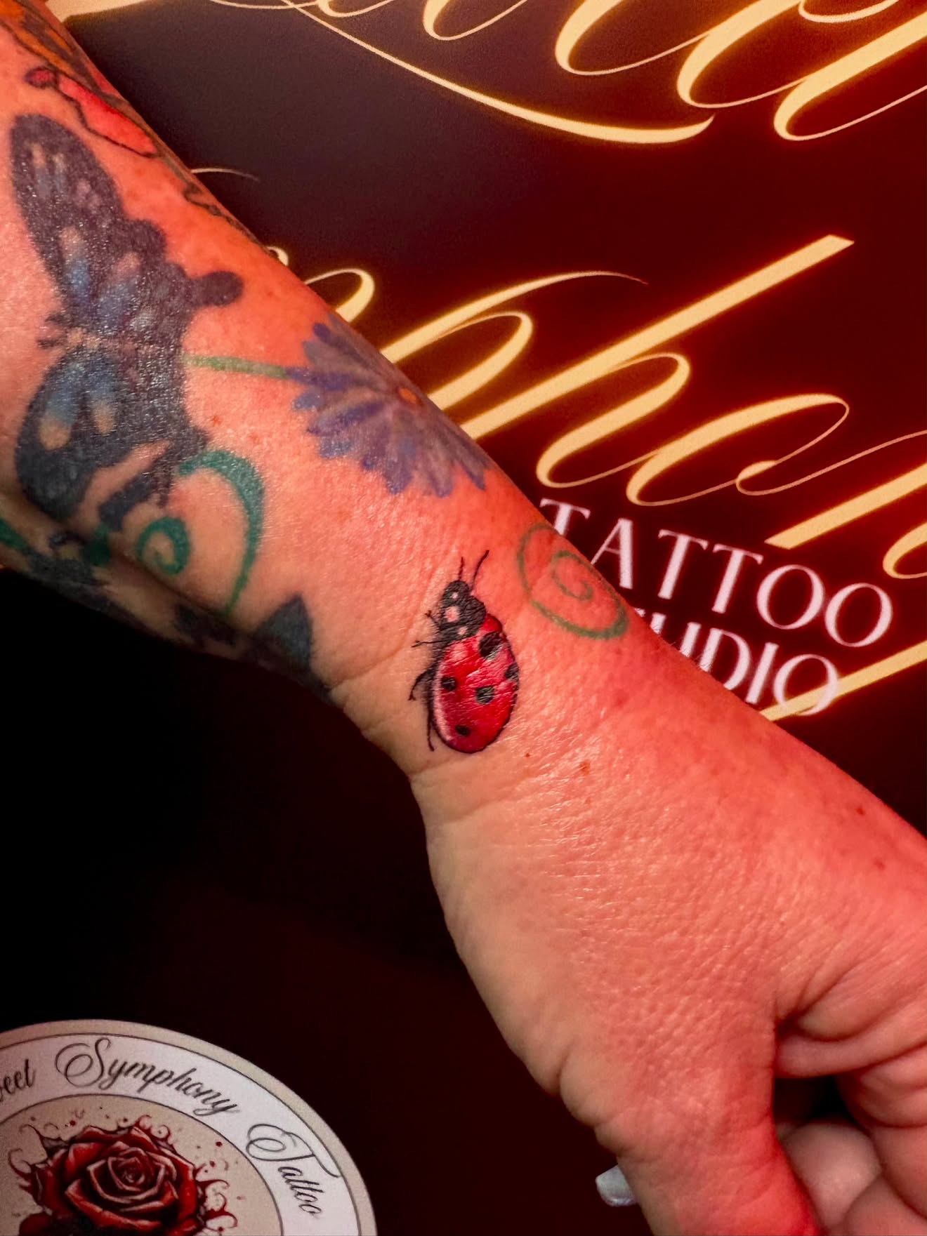 Fine-line tattoo by Sarah